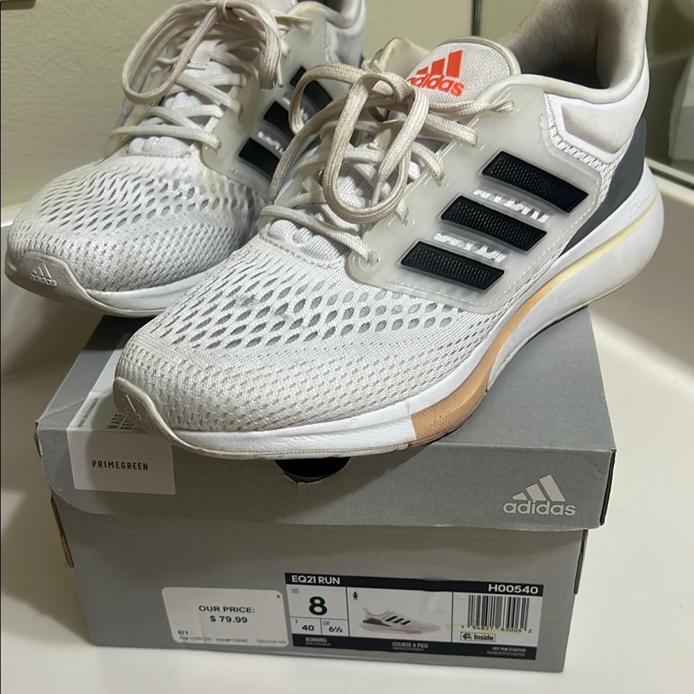 Adidas White and Black Athletic Shoes with Breathable Knit Upper